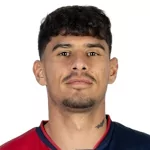 F. Coman